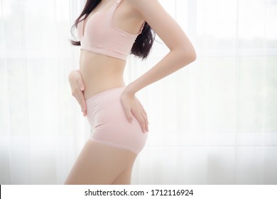 Closeup Asian Woman Wear Underwear Beautiful Body Belly Slim Shape Sexy With Diet At Room, Model Asia Girl Wear Bra Hand Touch Abdomen Thin With Weight Loss, Health And Wellness Concept.