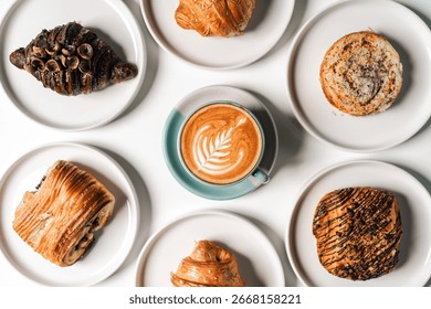Close-up of assorted breakfast items and coffee arranged beautifully on a table