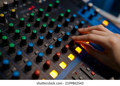 Closeup Audio Engineer Hand On Sound Mixer Control Panel