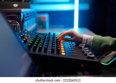 Closeup Audio Engineer Hand On Sound Mixer Control Panel