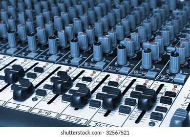 closeup of a audio mixing board
