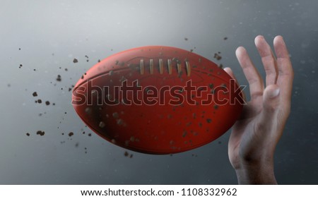 A closeup of an aussie rules ball caught in slow motion flying through the air about to be caught by a dirty hand  - 3D render