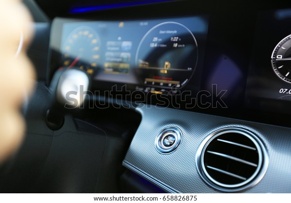 Close-up\
of an automatic start and stop car engine\
button