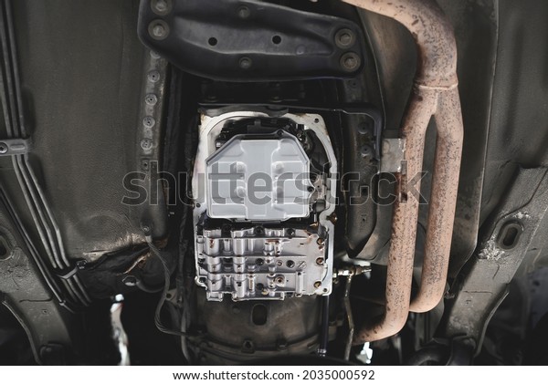Close-up of Automatic Transmission \
Filter. Automatic Transmission Service in Garage Services.\
