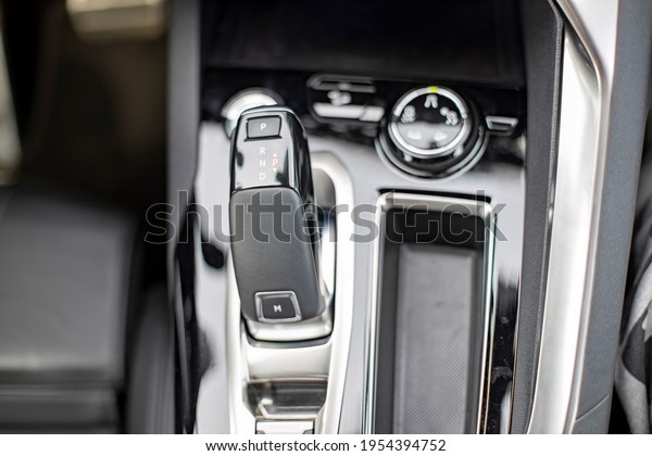 close-up of an automatic transmission knob in\
a new modern car. top view. car\
detail