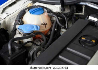 Close-up Of An Automotive Coolant Reservoir Tank.