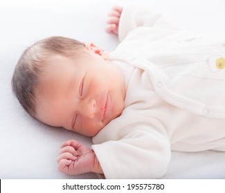 Close-up of a baby boy sleeping - Shutterstock ID 195575780