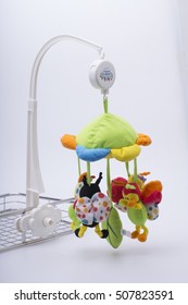 Closeup Of Baby Mobile Over White Background