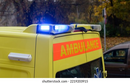 Close-up of back of ambulance switched lights on the street - Powered by Shutterstock