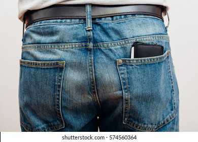 Closeup To Back Of Man, Jeans With Wallet In Pocket, People Studio Indoors Shot.