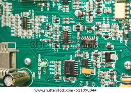 Close-up of the back side of a circuit board in electronics equipment.