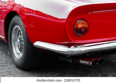 Close-up Of The Back Of A Vintage Red Sports Car