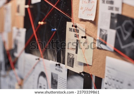 Closeup background image of evidence board with red thread connecting pictures, copy space