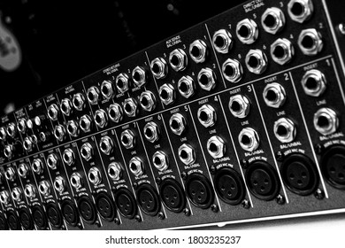 closeup of the background of a mixing console