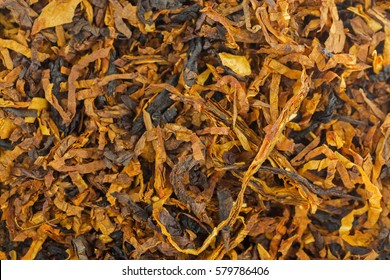 Closeup Background Texture Of Classic Blended Aromatic Pipe Tobacco With Vanilla Flavor 
