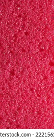 close-up, background, texture, large long vertical banner. heterogeneous surface fine pore structure bright saturated red pumice stone for finger care. full depth of field. high resolution photo - Shutterstock ID 2221562973