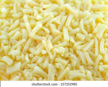 Closeup Background Texture Photo Of Shredded Mild Mozzarella Cheese Used In Italian Cooking