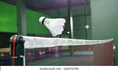 Closeup Of Badminton Shuttlecock Flying Across The Net.