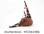 close-up of bagpipe from Scotland over white