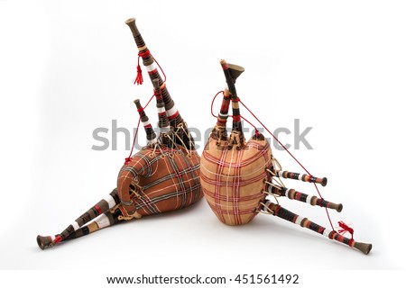 close-up of bagpipe from Scotland over white