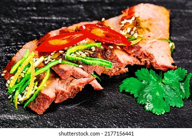 Close-up Of Baked Beef With Leek And Hot Chili Pepper