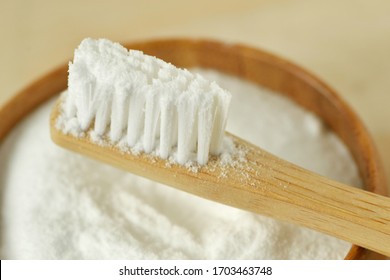 Close-up Of Baking Soda In A Bowl With A Wooden Toothbrush - Teeth Whitening