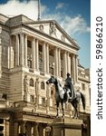 Close-up of Bank Of England`s facade with the statue of Duke of Wellington Statue (created by Francis Chantrey). City of London, England.