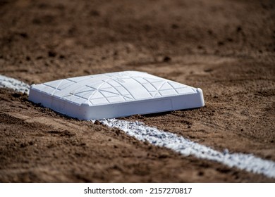 A closeup of a baseball base