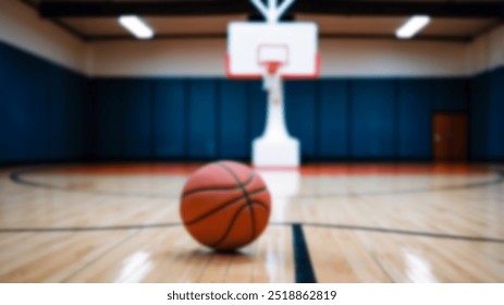 Close-up of a basketball resting on a wooden court with a blurred background, perfect for sports, basketball themes, and athletic content - Powered by Shutterstock