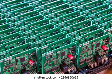Closeup of Batch or Line of Ready ABS Automotive Printed Circuit Boards with Placed Soldered Surface Mounted Components.Horizontal Shot