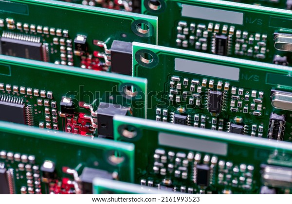 Closeup of Batch or Line of Ready ABS Automotive\
Printed Circuit Boards with Soldered Surface Mounted Components.\
Horizontal Shot