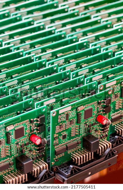 Closeup of Batch or Line of Ready ABS Automotive\
Printed Circuit Boards with Placed Soldered Surface Mounted\
Components.Vertical\
Image