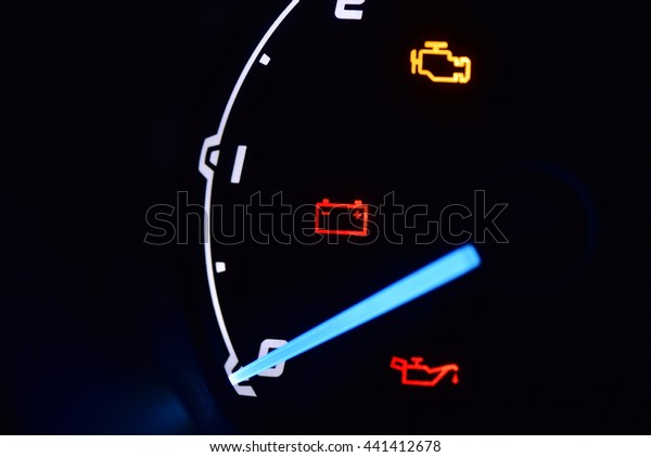 Closeup battery,engine and oil engine light on dashboard\
car 