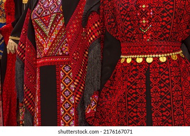 Closeup to beaded dress, traditional dress of Palestine and Jordan, handmade fashion style - Shutterstock ID 2176167071