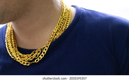 Close-up Bearded Man Wearing Gold Necklace.