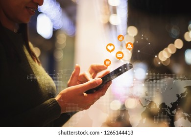 closeup of beautiful Asia woman,girl using smartphone ,mobile phone working ,playing  with fun and happy in free time on holiday. Bokeh background. - Shutterstock ID 1265144413