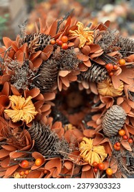 Closeup of beautiful autumn fall themed wreath with all the elements of autumn combined. 