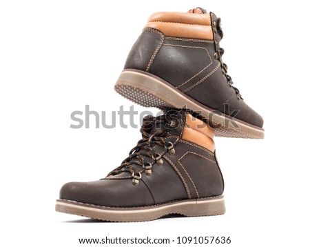 Closeup of beautiful and comfortable winter mens shoes from isolated on white background.