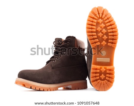 Closeup of beautiful and comfortable winter mens shoes from isolated on white background.