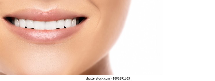 Closeup Of Beautiful Female Smile With A White Teeth