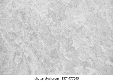 Closeup Of Beautiful Stone Texture Wall In Light Grey Tone For Rough Surface And Modern Background, Interior And Marble Decoration. Cool Banner On Page, Cover, And Website. Monochrome Seamless Pattern