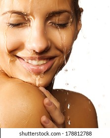  Close-up Of Beautiful Wet Woman Face With Water Drop. On White Background 