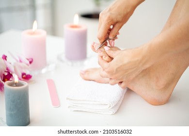 Closeup Of Beautiful Woman Legs Getting Pedicure At Home