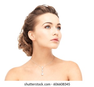 Close-up Of Beautiful Woman Wearing Shiny Diamond Necklace