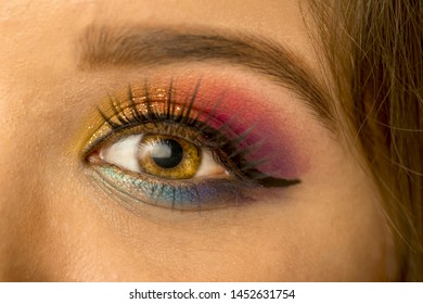Close-up of beautiful woman's eye with colorful make-up. - Shutterstock ID 1452631754