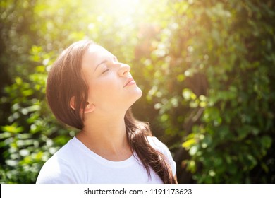 Close-up Of A Beautiful Young Woman Closing Her Eyes