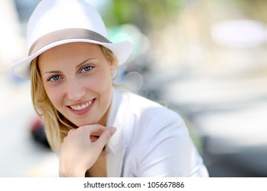 Closeup of beautiful young woman with hat - Powered by Shutterstock