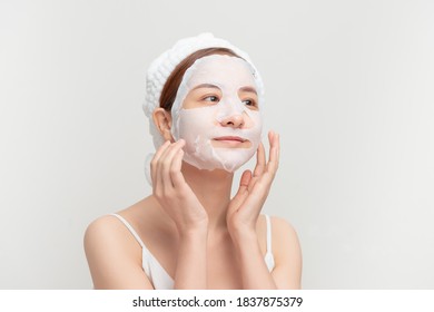 Closeup Beauty Portrait Of Beautiful Woman With A Mask On Her Face For Treatment