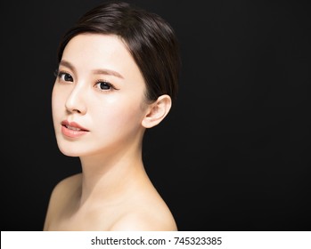 closeup Beauty woman face isolated on black background