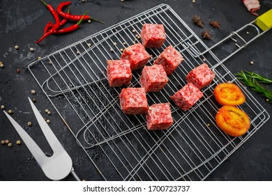 Closeup Of Beef Cube Steak On The Grill With Tomato